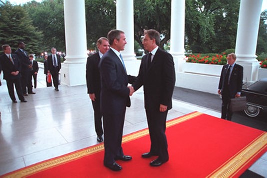 Tony Blair and George W Bush greeting each other the entrance of the White House, 20th September 2001
